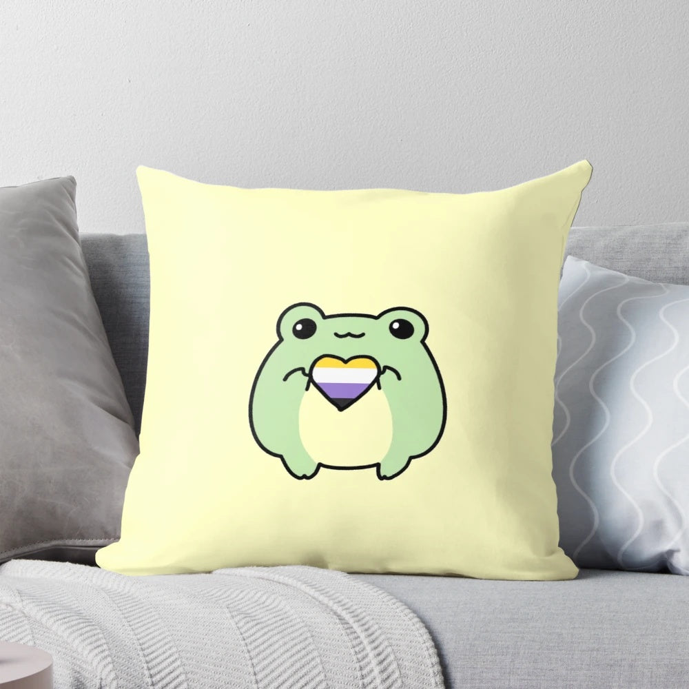 A colorful non-binary pride flag-inspired pillow featuring a whimsical frog design