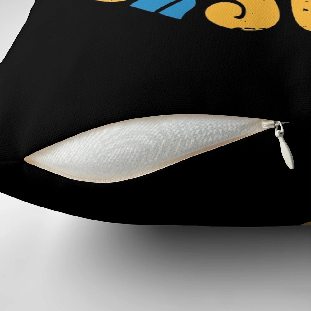 A vibrant and colorful pillow featuring the iconic "Here Comes the Sun" design from the Beatles.