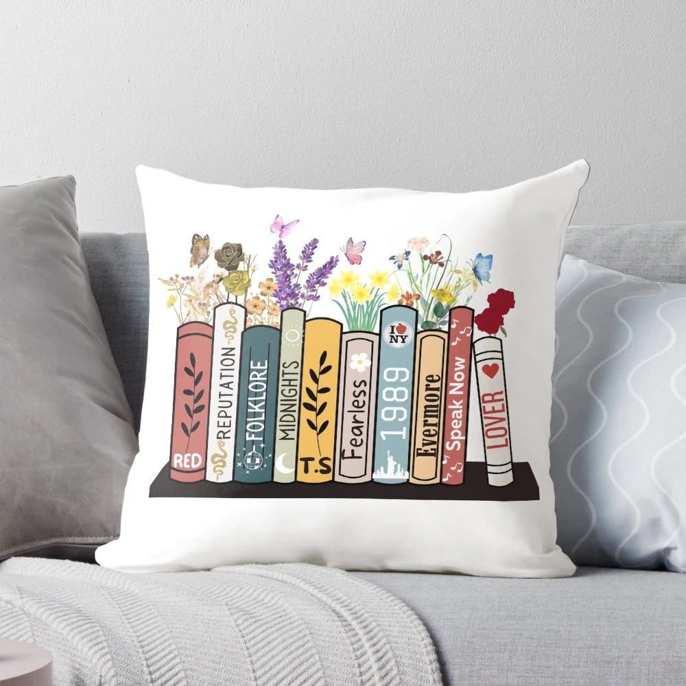 Pillow featuring Taylor Swift's album covers as book spines and flowers, perfect for country music fans