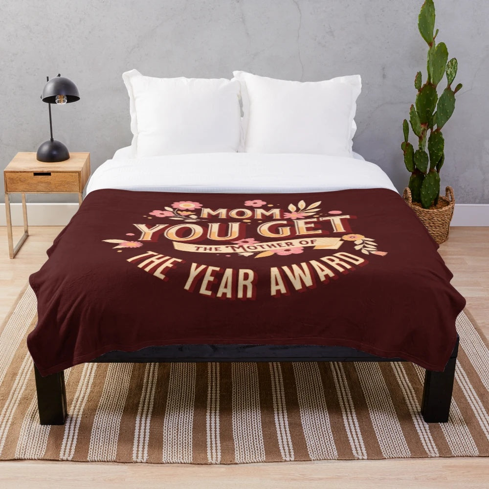 Plush blanket that says "Best Mom In The History Of Ever