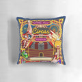 Colorful circus-themed pillow with acrobats, tents, and festive elements