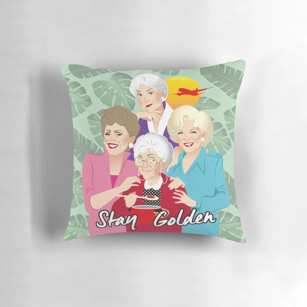 A cozy pillow featuring the iconic "Golden Girls" characters
