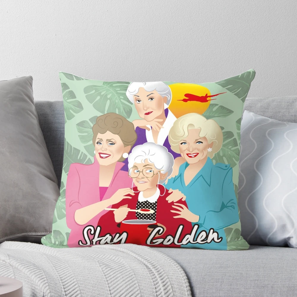 A cozy pillow featuring the iconic "Golden Girls" characters