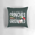 Clark Griswold and the Griswold family from the classic Christmas movie "Christmas Vacation" on a decorative holiday pillow.