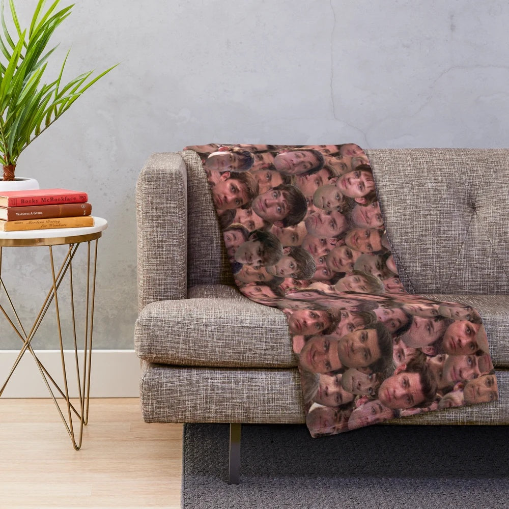 Plush blanket featuring a mashup of Jim Halpert's iconic facial expressions from The Office