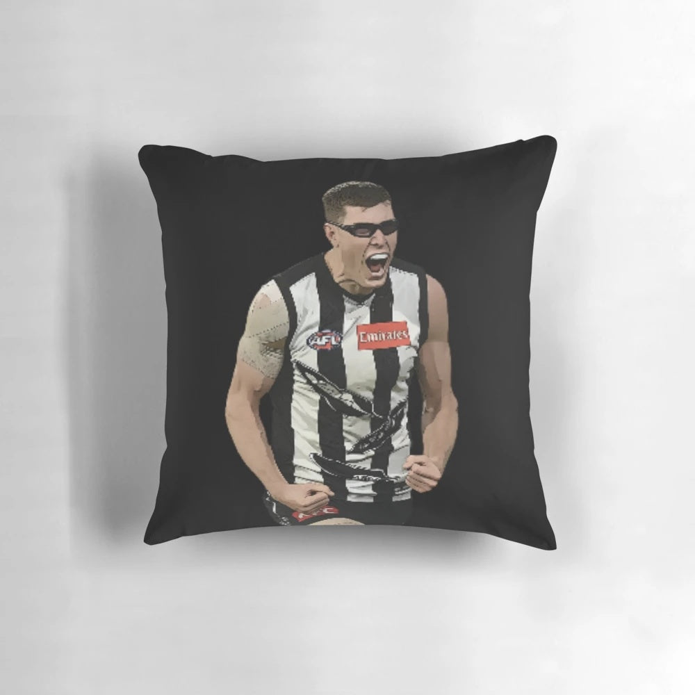 A cozy throw pillow featuring the epic goal celebration of Collingwood Magpies player Mason Cox