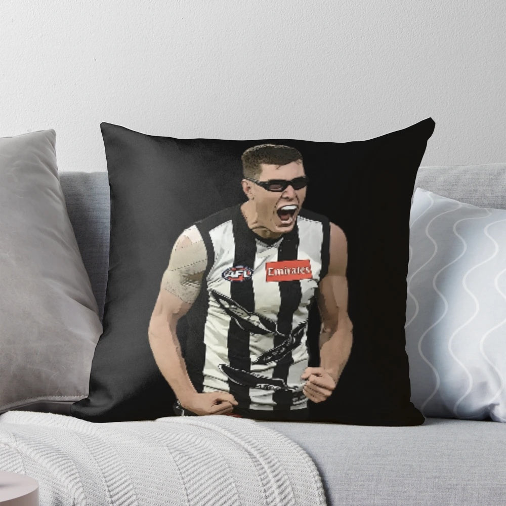 A cozy throw pillow featuring the epic goal celebration of Collingwood Magpies player Mason Cox