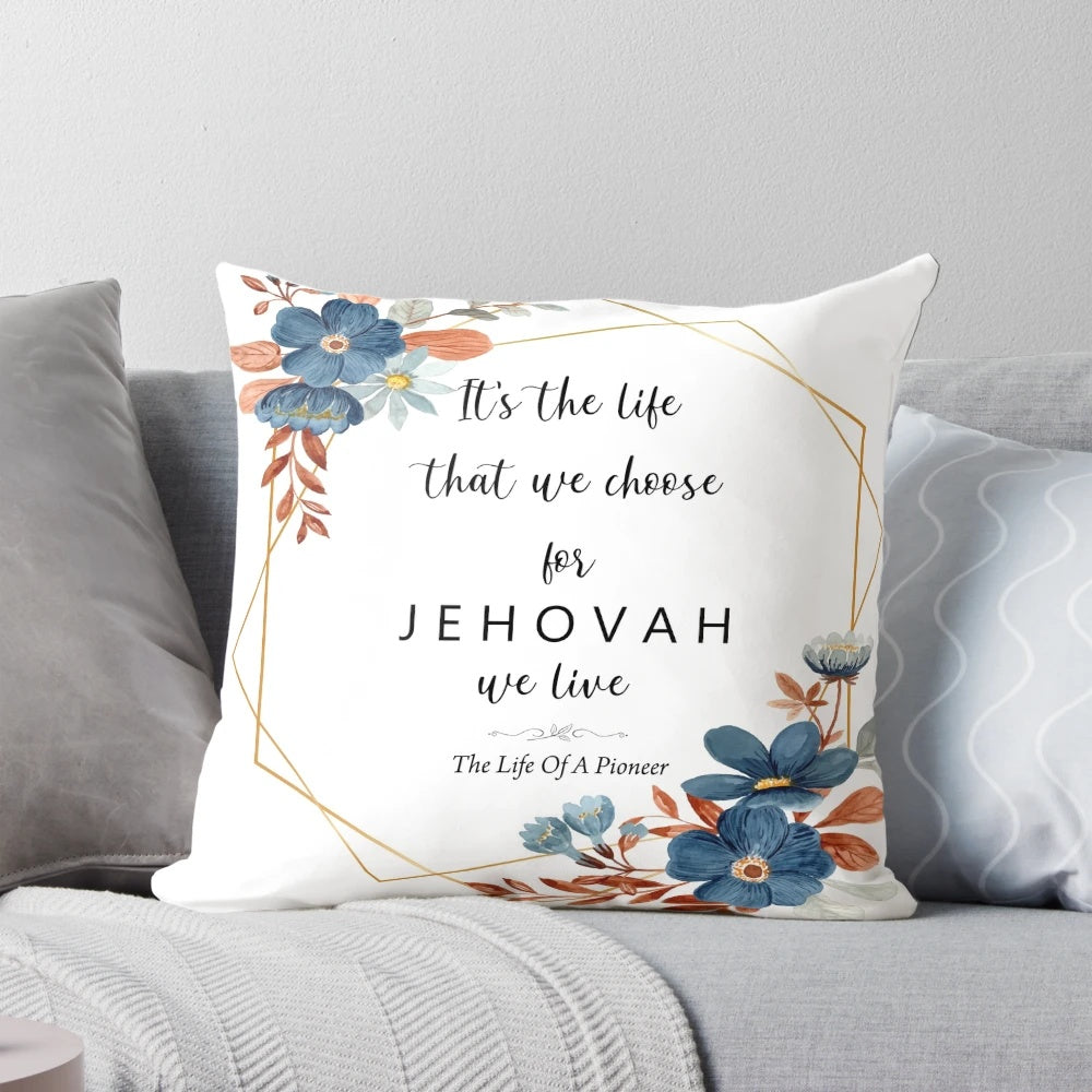 Floral pillow with the text "The Life Of A Pioneer" on it