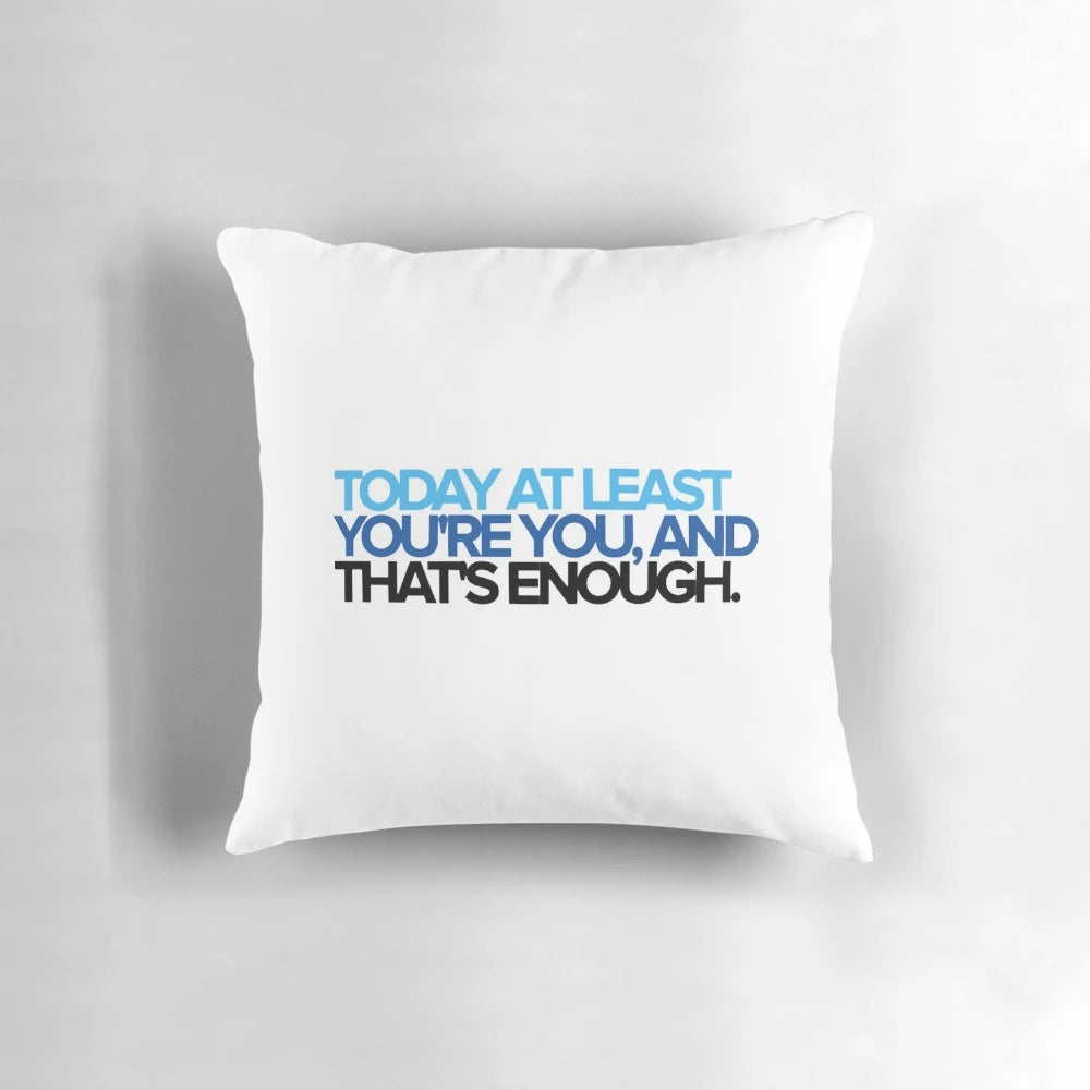 A fluffy white pillow with the text "You're You" printed on it, inspired by the beloved Broadway musical 'Dear Evan Hansen'.