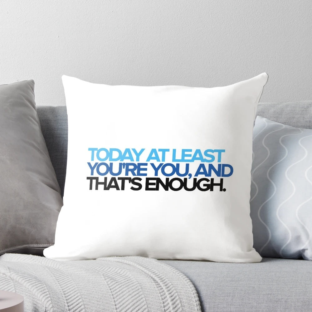 A fluffy white pillow with the text "You're You" printed on it, inspired by the beloved Broadway musical 'Dear Evan Hansen'.