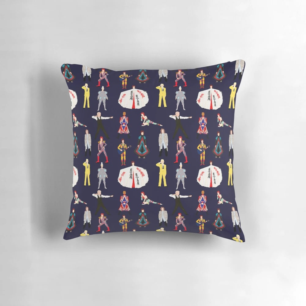 A colorful pillow featuring illustrations of David Bowie's iconic Ziggy Stardust and Let's Dance album covers