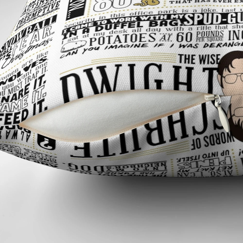A throw pillow featuring a typographic design with the words "The Wise Words of Dwight Schrute" on a light-colored background.