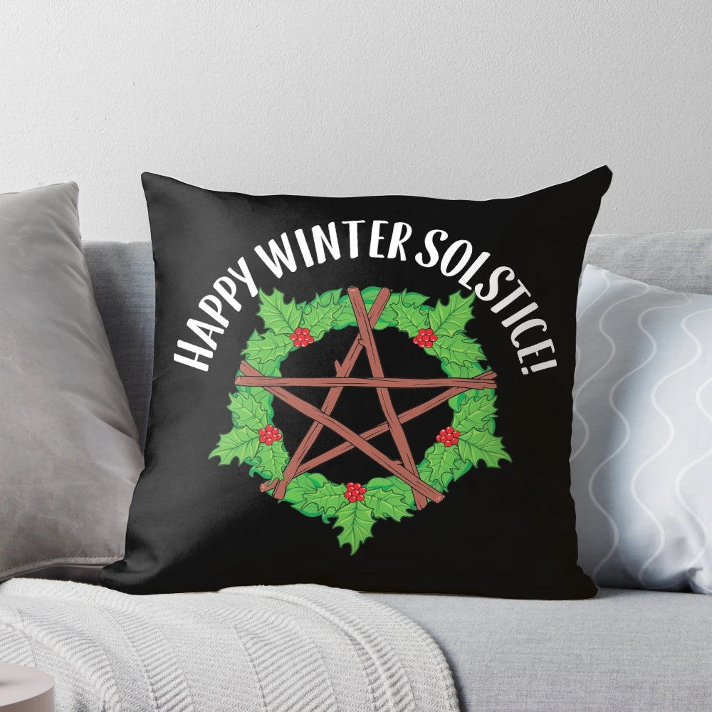 Pagan yule celebration pillow featuring a happy winter solstice graphic design