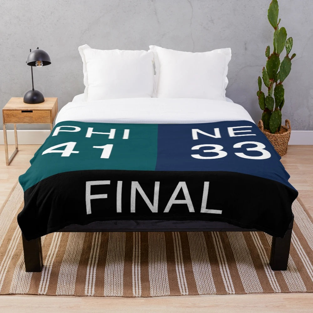 Philadelphia Eagles Plush Blanket featuring the team's logo and colors