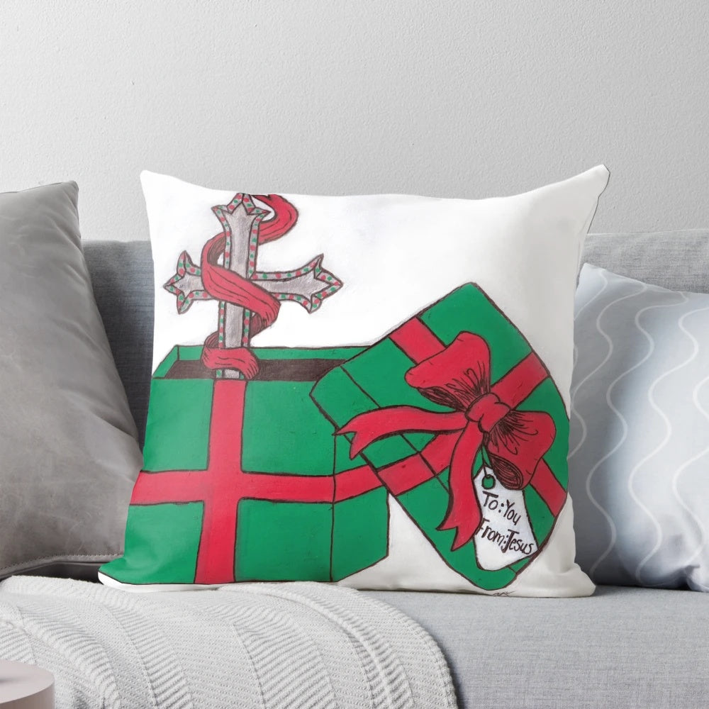 A cozy and inspirational Christian Christmas gift pillow featuring a cross design and festive colors