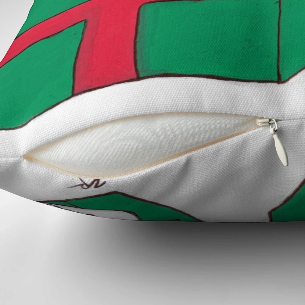 A cozy and inspirational Christian Christmas gift pillow featuring a cross design and festive colors