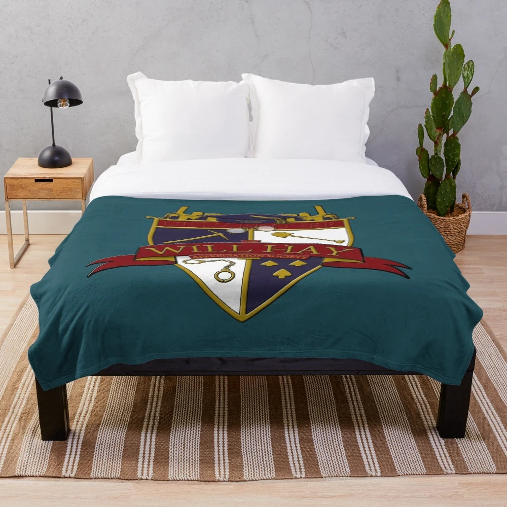 Plush blanket featuring the crest of the Will Hay Appreciation Society