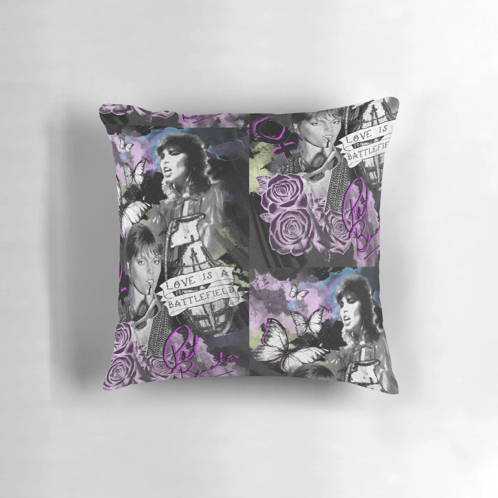 A decorative pillow featuring the iconic image of 80s rock legend Pat Benatar, celebrating women in music.