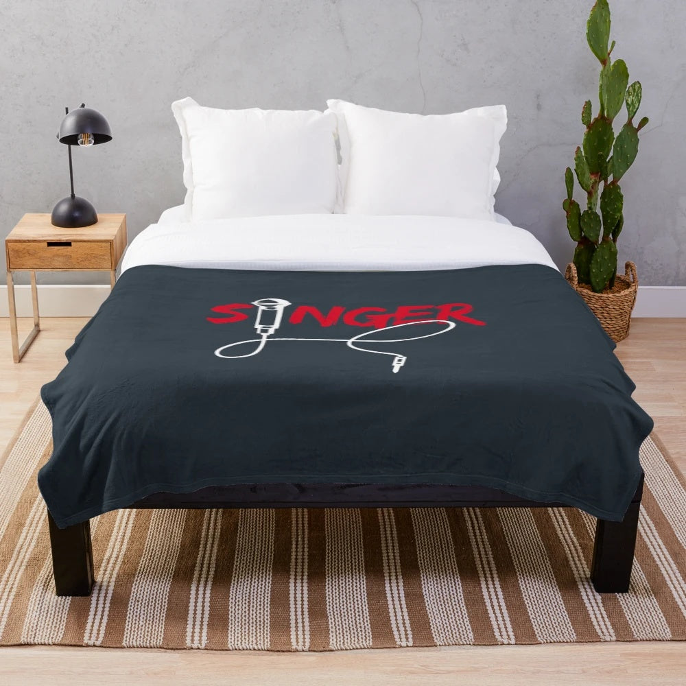 Plush blanket featuring a singer band festival music microphone design