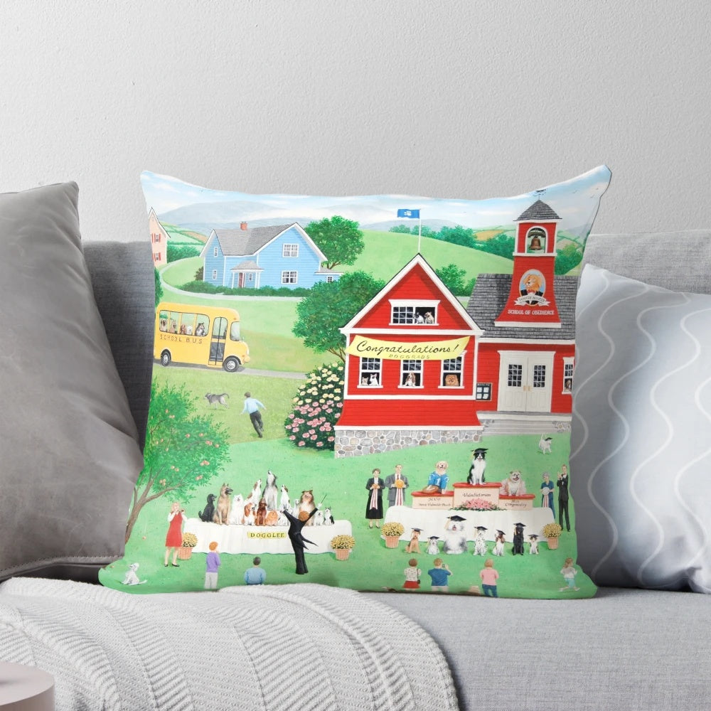 Whimsical dog-themed graduation pillow featuring a naive landscape with a school bus and graduates