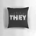 A cozy, nature-themed pillow with the text 'THEY' printed on it, representing gender identity and self-expression.