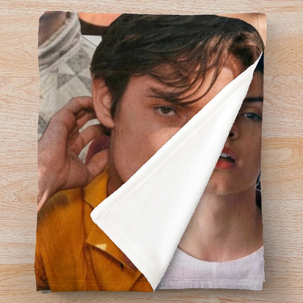 Louis Partridge photo collage design on a plush blanket