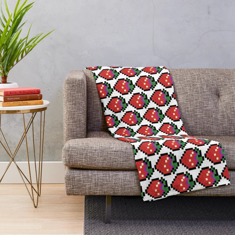 Celeste-inspired plush blanket featuring the game's iconic character Madeline and the Strawberry Sprite