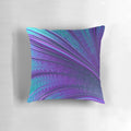 Abstract art throw pillow with a blue and purple cosmic design evoking the night sky and fractal patterns.