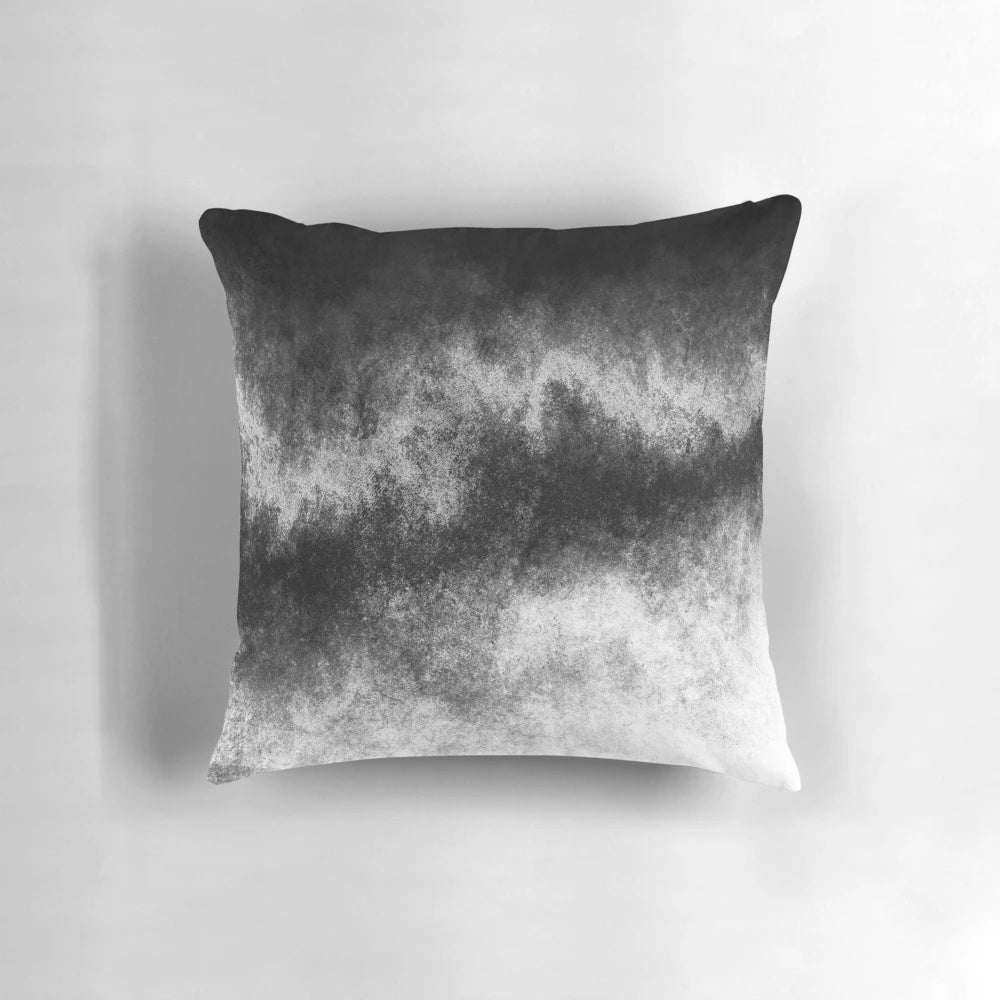 Closeup of an abstract, galaxy-inspired pillow with a worn, vintage texture