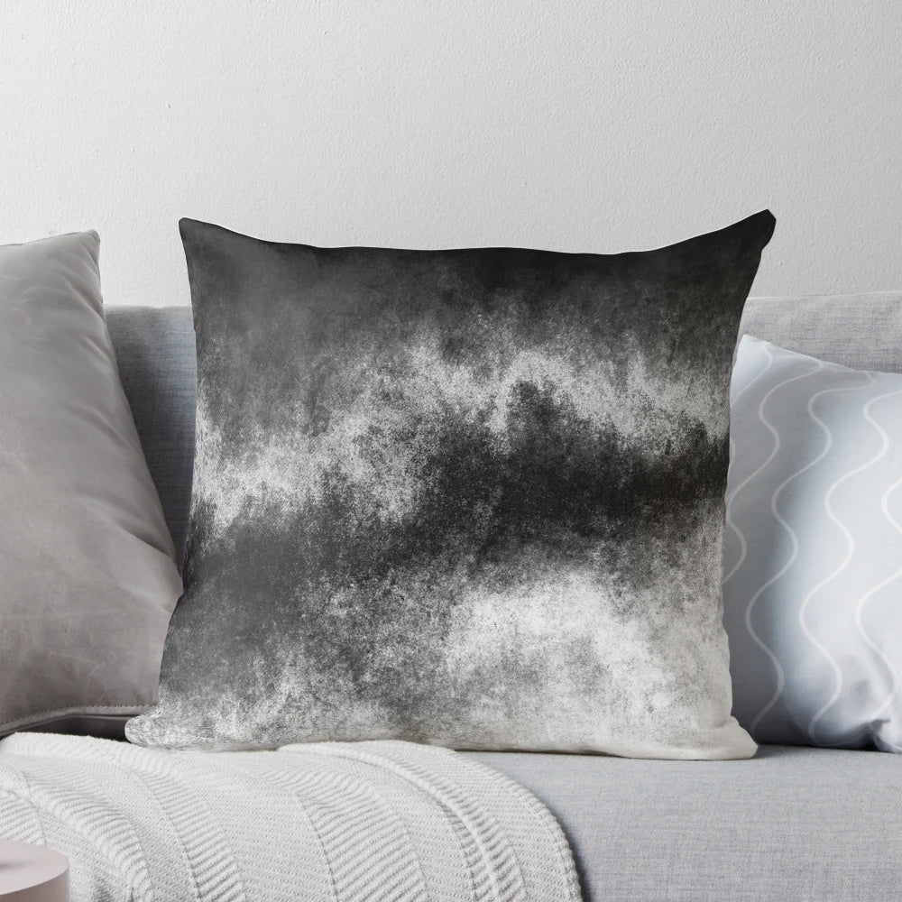 Closeup of an abstract, galaxy-inspired pillow with a worn, vintage texture