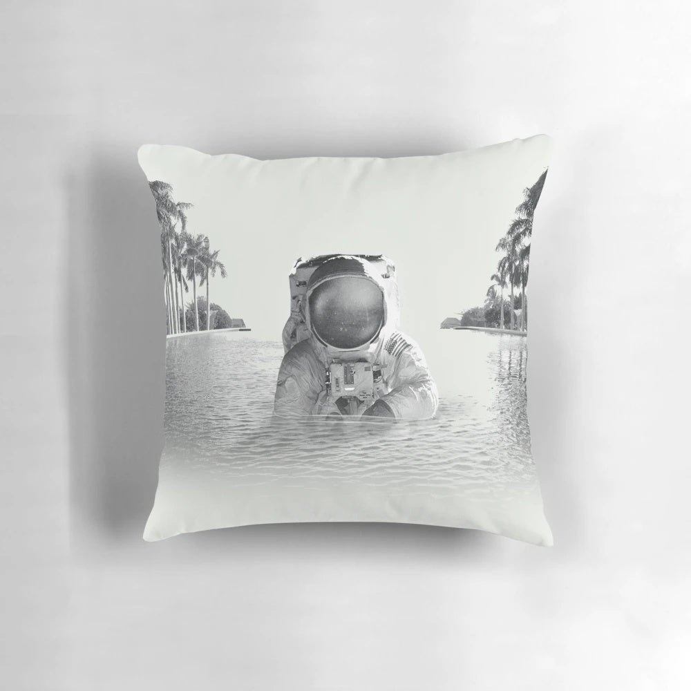 Vibrant space-themed pillow featuring an astronaut in a psychedelic, cosmic design