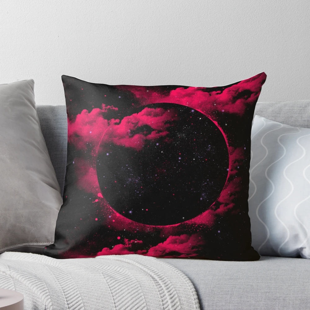 Stylish black hole-inspired pillow design featuring a pink and black space theme.