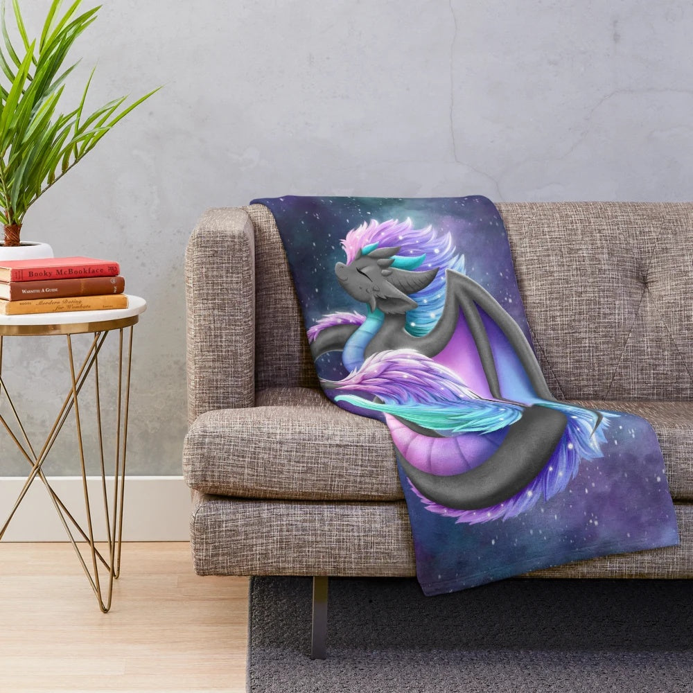 Borealis plush blanket with cosmic, mythical creature design