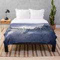 Plush blanket featuring whimsical castle in the sky design, perfect for anime and fantasy enthusiasts