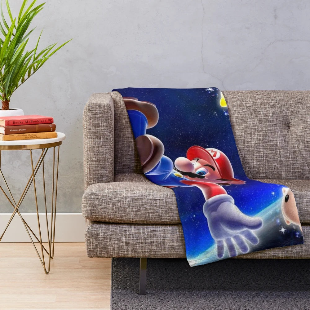 A plush blanket featuring a galaxy-inspired design, perfect for cozy nights.