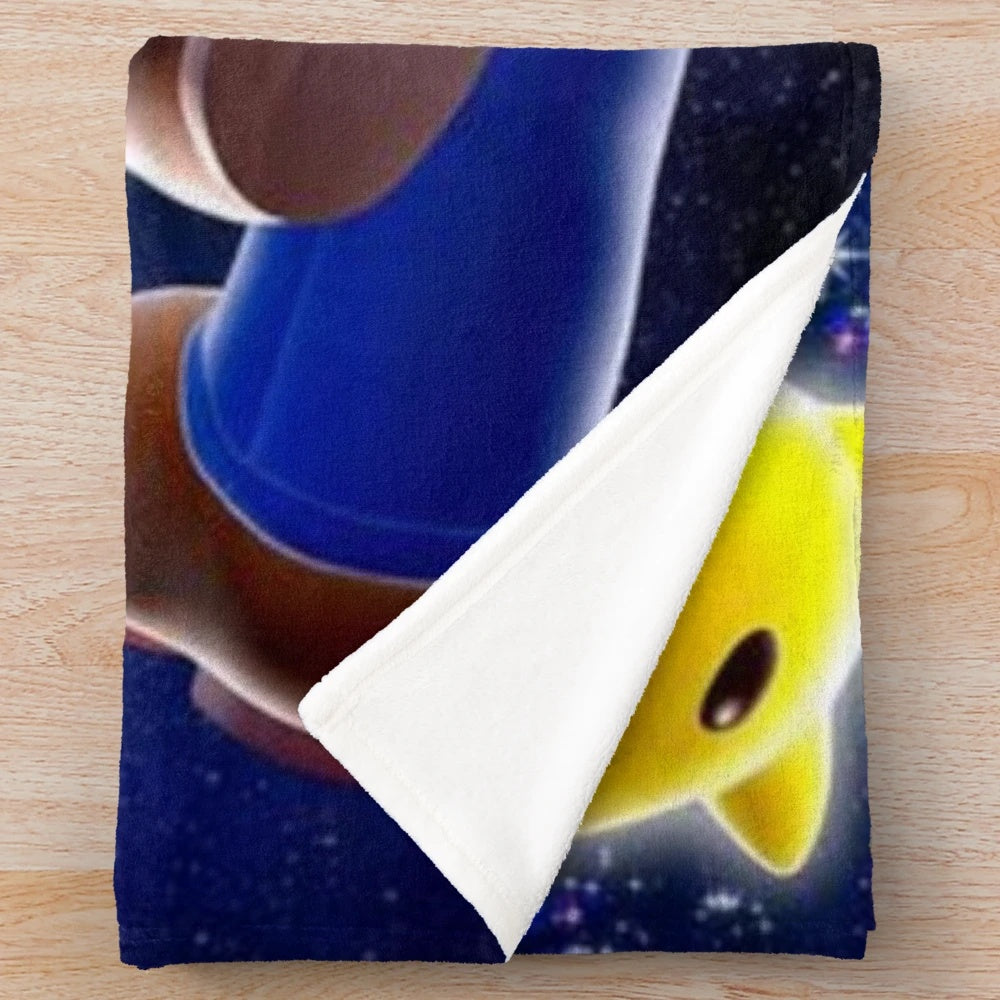 A plush blanket featuring a galaxy-inspired design, perfect for cozy nights.