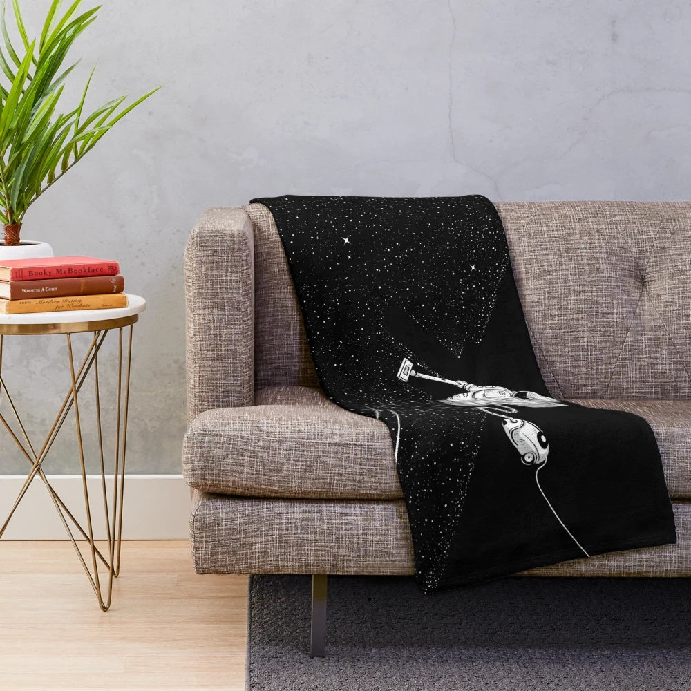 Cozy plush blanket featuring a galaxy-inspired cosmic design