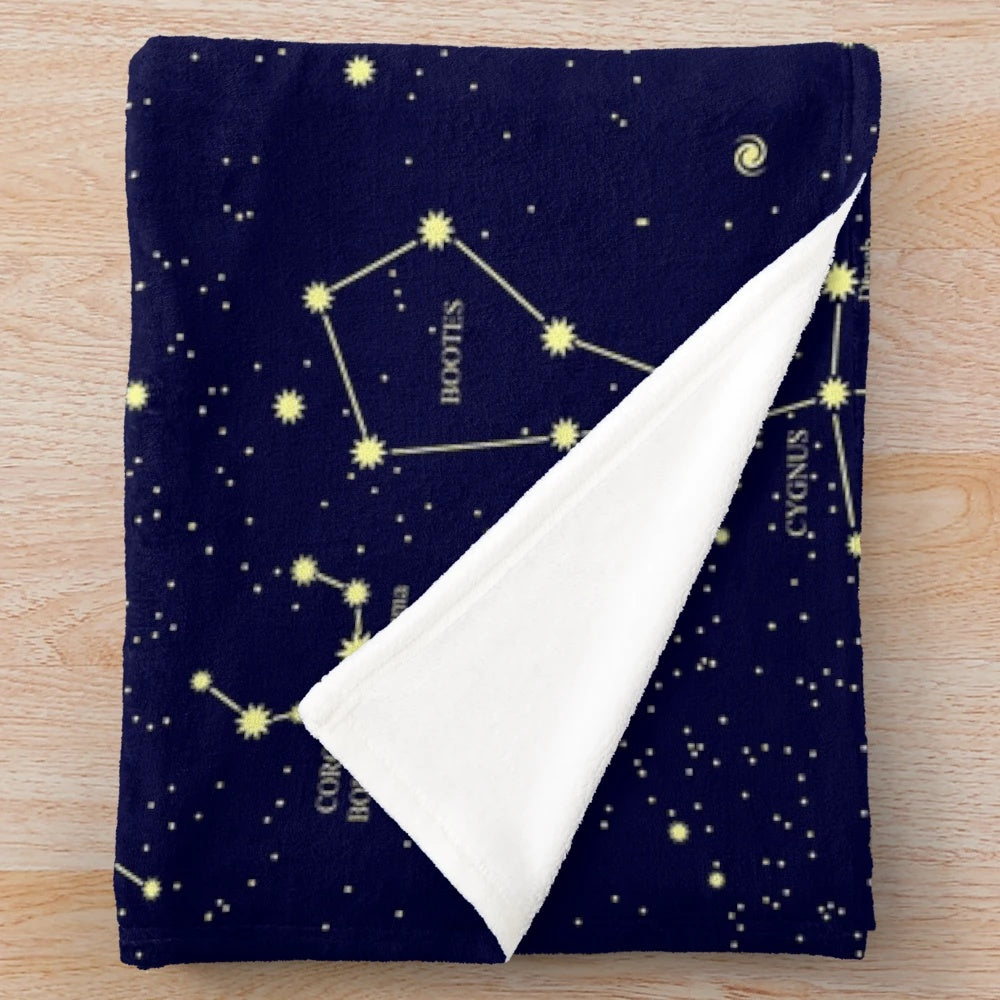 Cozy plush blanket featuring a detailed constellation and galaxy design