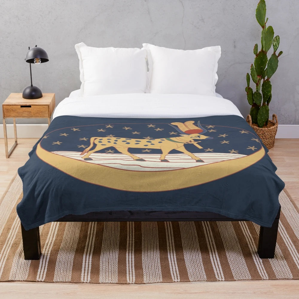 Plush blanket featuring the ancient Egyptian goddess Hathor, the celestial cow deity