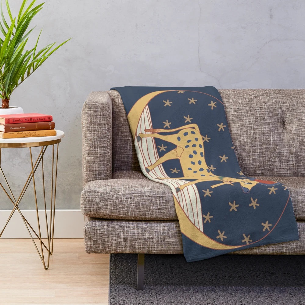 Plush blanket featuring the ancient Egyptian goddess Hathor, the celestial cow deity