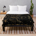 Celestial crescent moon plush blanket with floral accents and moon phases