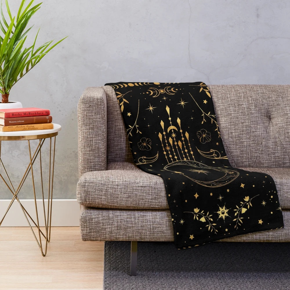 Celestial crescent moon plush blanket with floral accents and moon phases