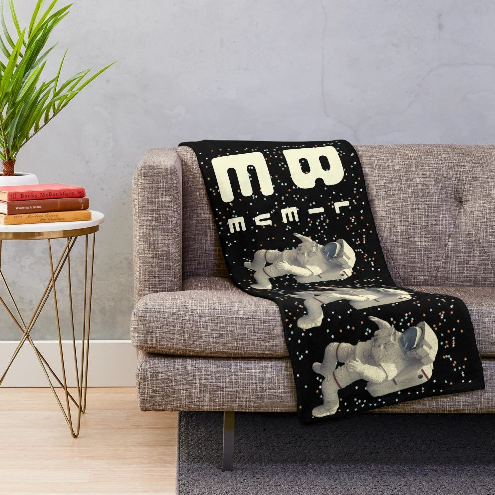 Astronaut plush blanket with galaxy and stars design