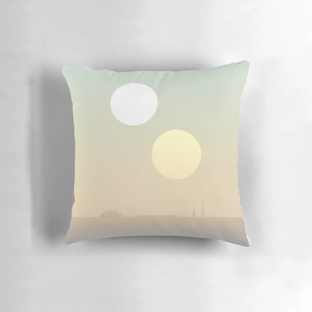 A cozy pillow featuring the iconic twin suns of the planet Tatooine from the Star Wars universe.