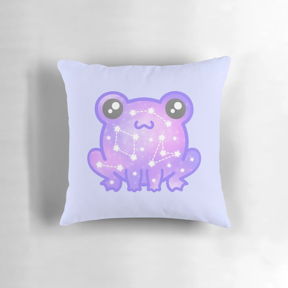 A vibrant galaxy-themed pillow featuring a whimsical frog design, perfect for frog and space enthusiasts.