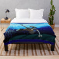 Soft and cozy plush blanket with a galaxy print design and depiction of the Wall-E robot