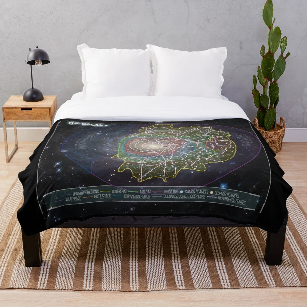 Galaxy-patterned plush blanket