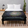 Galaxy-patterned plush blanket