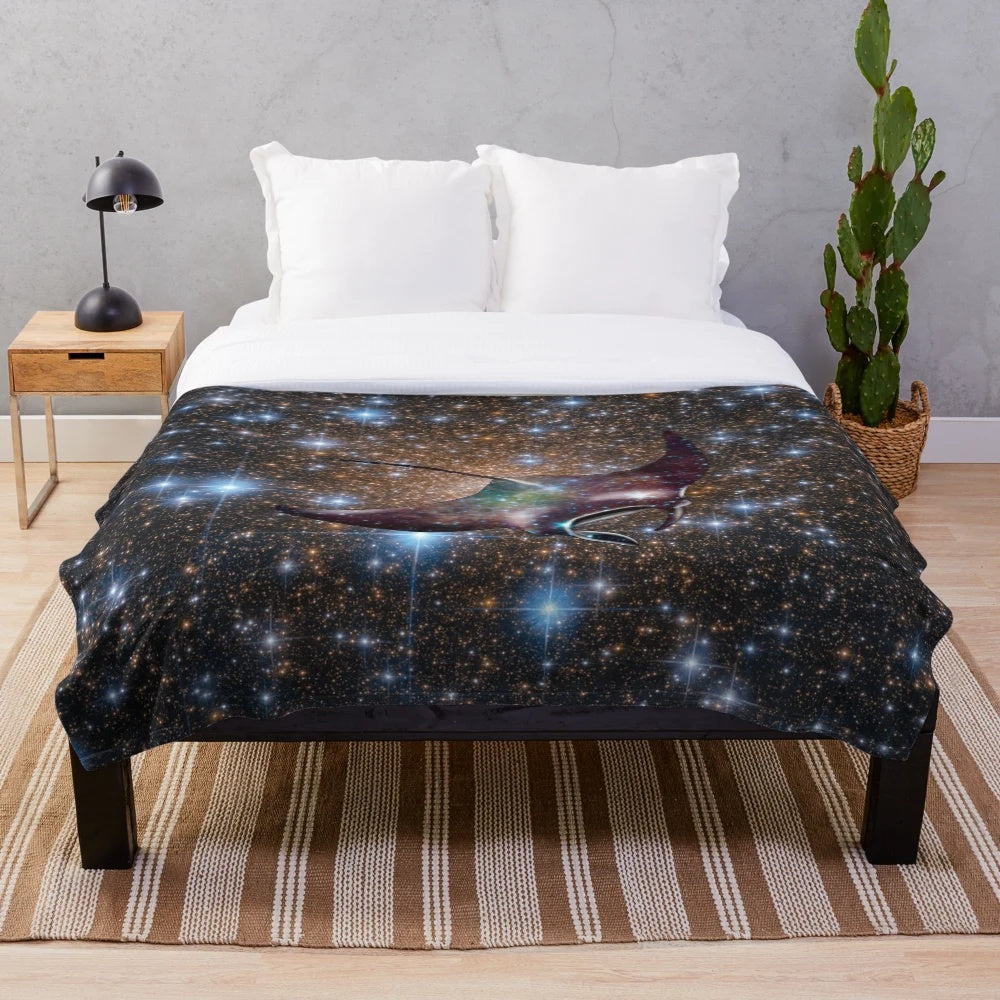 Soft and cuddly plush blanket with a galaxy-inspired manta ray design