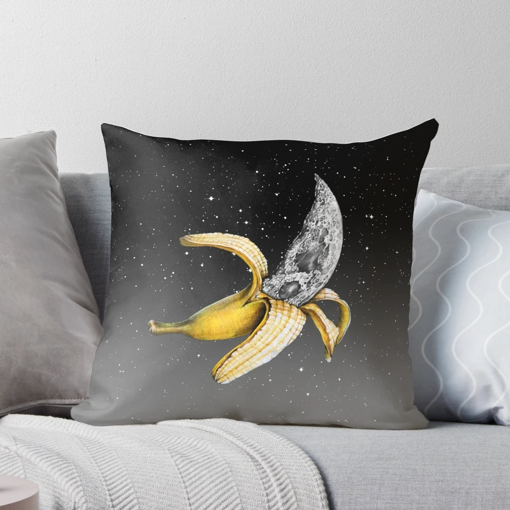 Whimsical moon-shaped banana pillow with stars and cosmic elements, perfect for surreal and abstract space-themed home decor.
